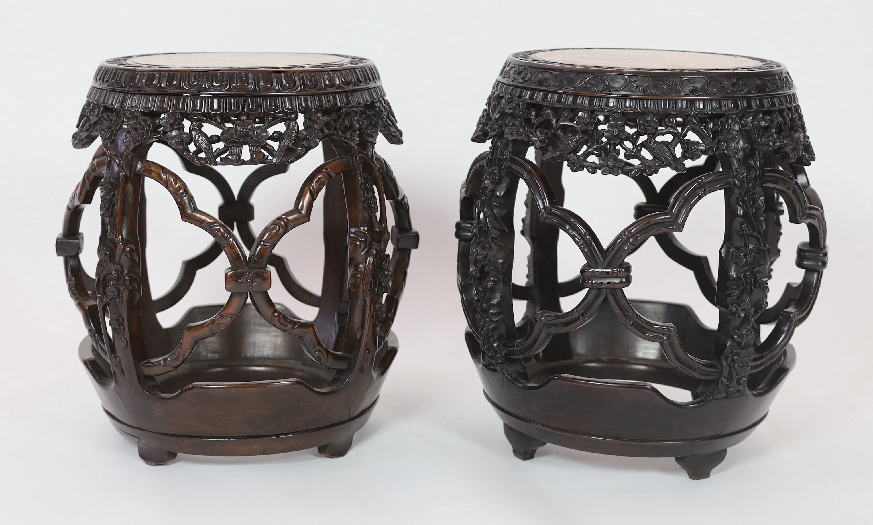 A near pair of Chinese hongmu and rouge marble inset stools, late 19th century